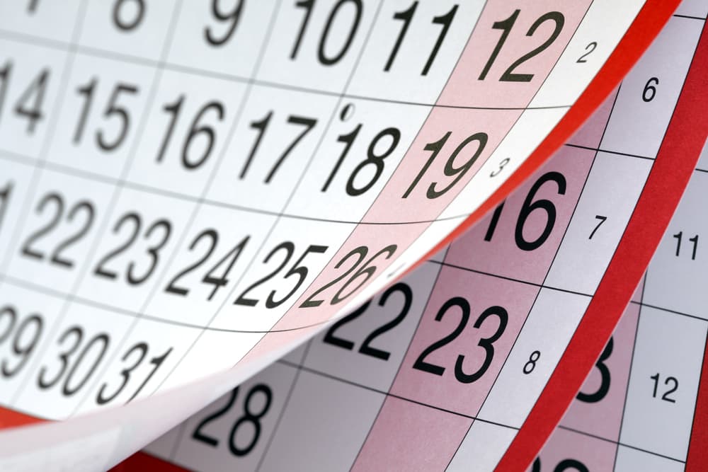 Months,And,Dates,Shown,On,A,Calendar,Whilst,Turning,The