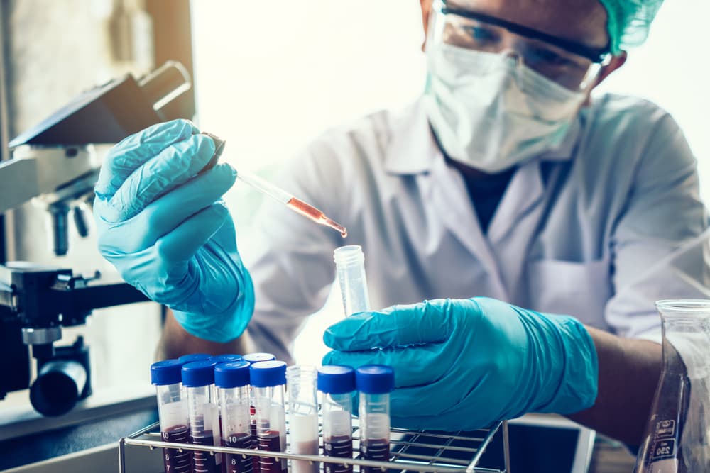 Scientist,Hand,Holding,A,Test,Tubes,laboratory,Research.