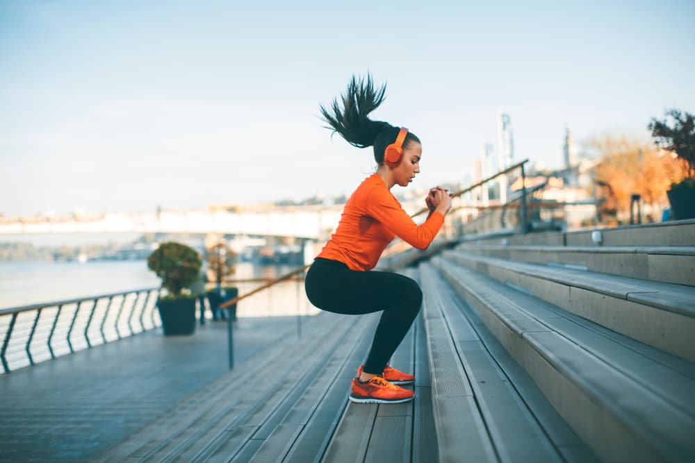 Fitness,Woman,Jumping,Outdoor,In,Urban,Environment