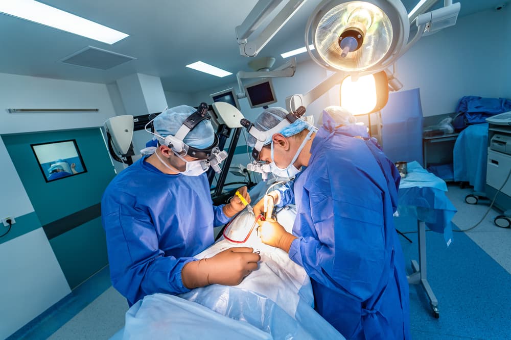Spinal,Surgery.,Group,Of,Surgeons,In,Operating,Room,With,Surgery