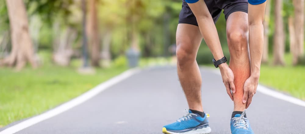 Young,Adult,Male,With,His,Muscle,Pain,During,Running.,Runner