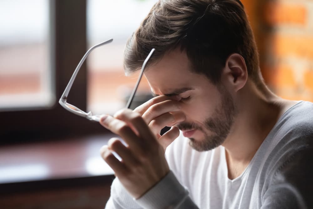 Close,Up,Of,Tired,Male,Take,Off,Glasses,Massage,Eyes