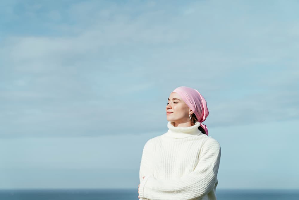 Young,Woman,With,Cancer,And,Crossed,Arms.,She,Is,Closed