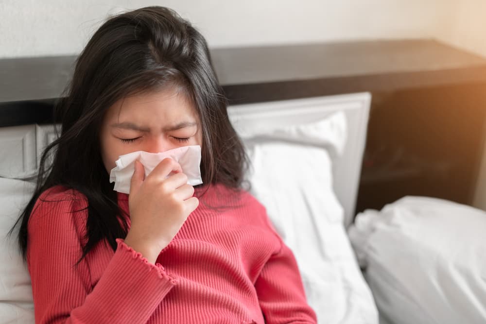 Sick,Asian,Girl,Have,Hight,Fever,Flu,And,Sneezing,Into