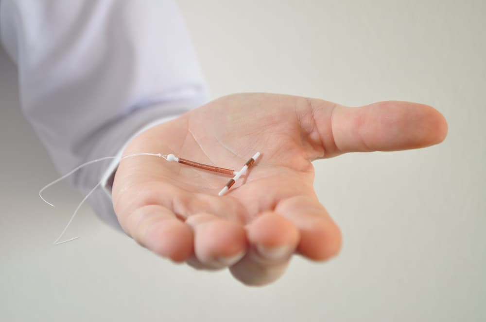 Holding,An,Iud,Birth,Control,Copper,Coil,Device,In,Hand,