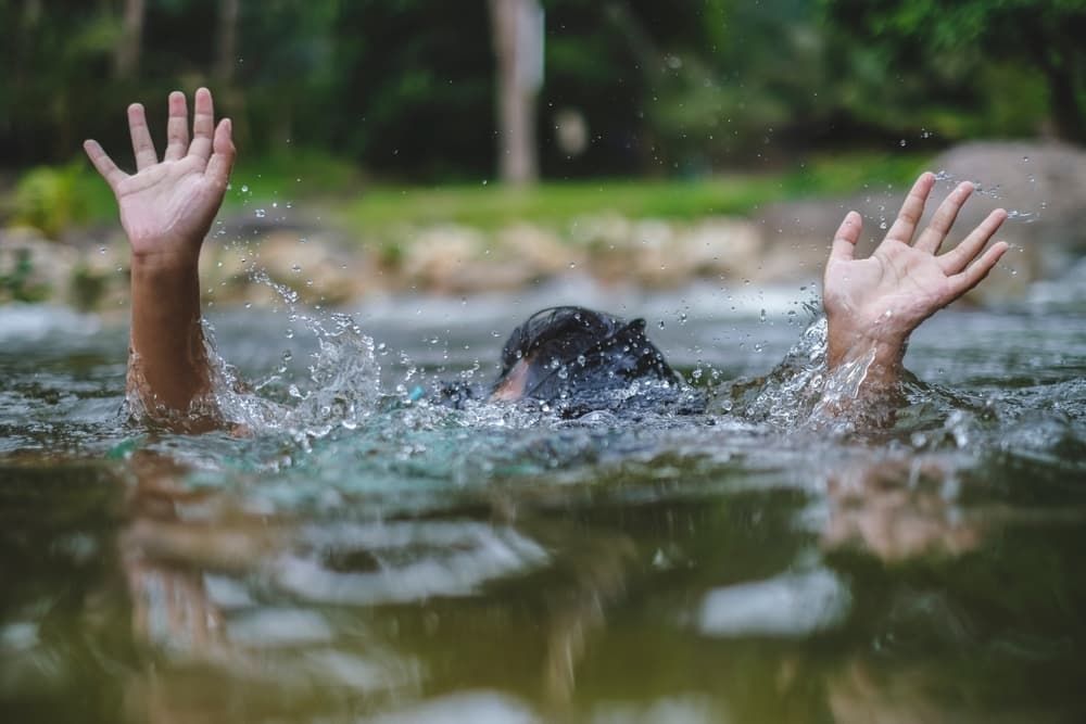 Person,Drowns,In,The,River,Reaching,For,Help.,Hand,Drowning